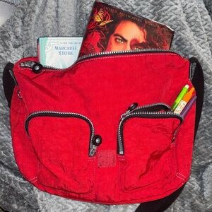 Kipling red shoulder sling bag